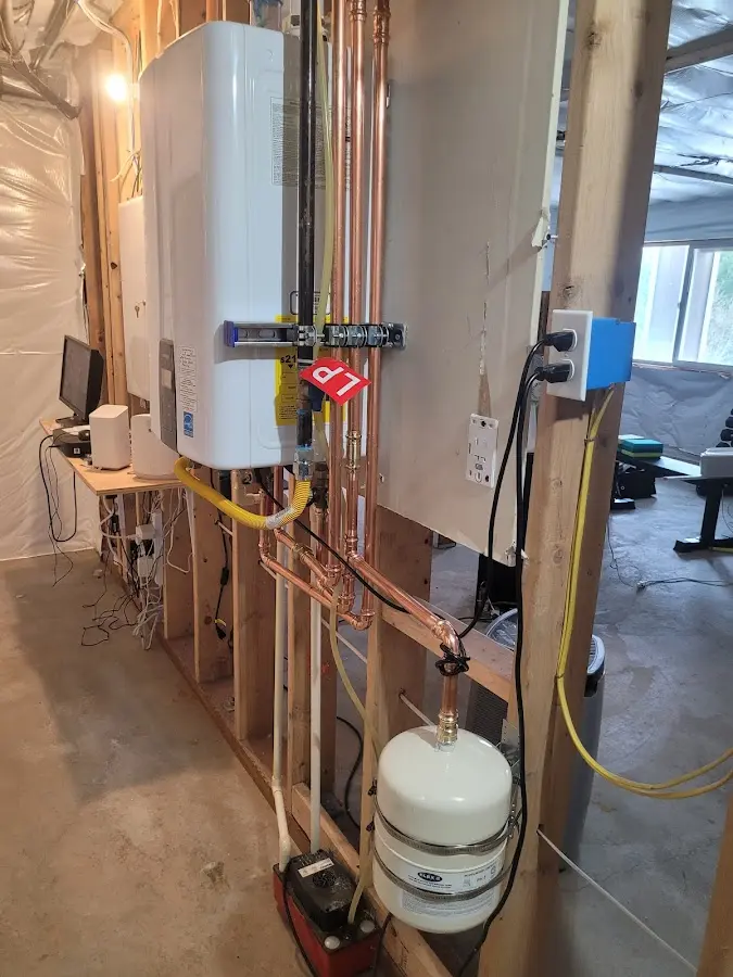 Licensed plumber repairing a kitchen sink in Brownfield